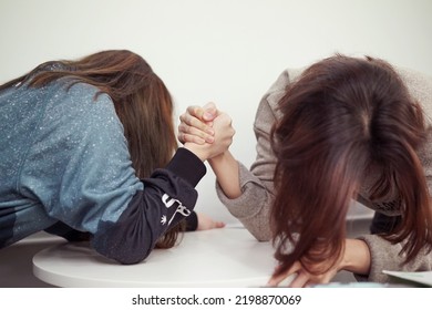 People Try Their Best To Win Arm Wrestling