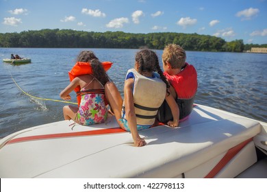 People Tubing On An Inland Lake