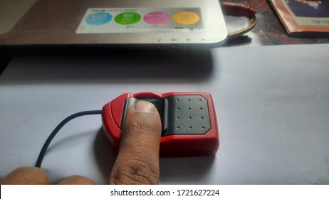 People Using Biometric Machine To Withdraw Money From Account In Rural India With The Help Aadhar Enabled Payment System 