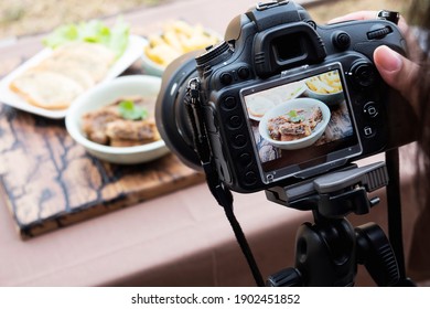 People using digital camera taking food photograph or video product - Powered by Shutterstock