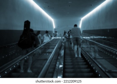 People using electric escalator in metro. - Powered by Shutterstock