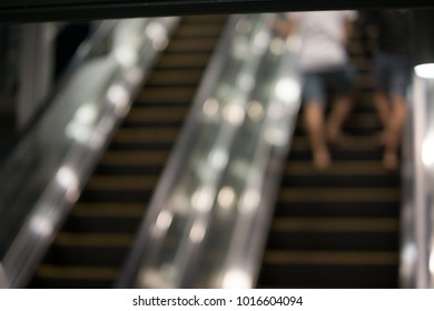 People are using the escalator People are using the escalator with  blur effect.
