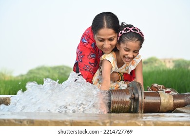 People Of Village Using Hand Pump For Water