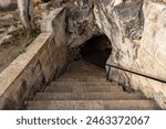 People visiting the sacred place, Eshab-i Kehf Cave ( Seven Sleepers Cave). The Seven Sleepers Ruins or Ashab-ı Kehf Cave located at Tarsus, Turkey, is one of the most visited places in the region.