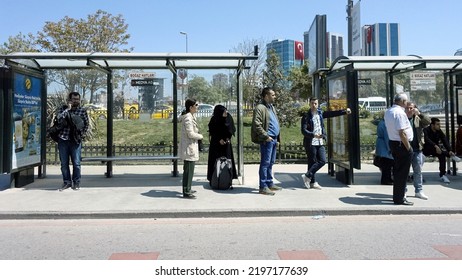 People Wait At A Busstop On A Street In The City Centre On April 23, 2018 In Istanbul, Turkey.