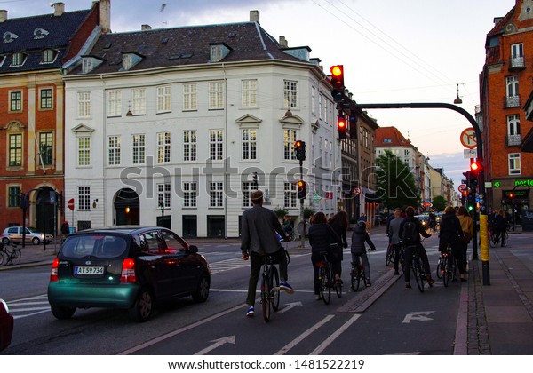 People are waiting with the bikes at\
the traffic lights, Copenhagen, Denmark, 07.09.2018\
