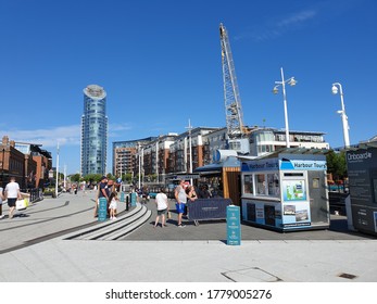 People Waiting At The Ice Cream Shop After Busy Day Of Shopping At Gunwarf Quays, Portsmouth, England, UK 18-July-2020