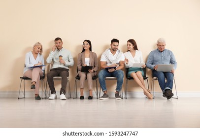 People Waiting For Job Interview In Office