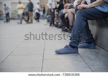 people waiting on the streets of barcelona