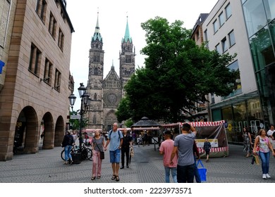 People Walk In Center Of Nuremberg, Germany On July 23, 2022.