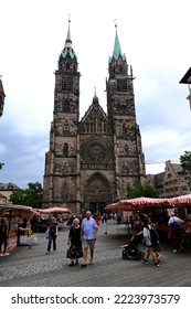 People Walk In Center Of Nuremberg, Germany On July 23, 2022.