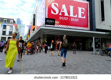 People Walk Down In Commercial Street During The Period Of The Summer Sales In Brussels, Belgium On July 13, 2022.