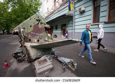 People Walk Next To A Fragment Of A Russian Military Aircraft During An Exhibition Displaying Destroyed Russian Military Equipment Amid Russian Invasion Of Ukraine In Kyiv, Ukraine. May 8, 2022.