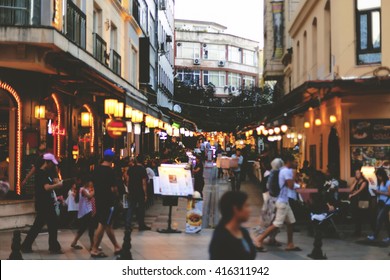 People Walk In Streets Of Istanbul At Night.