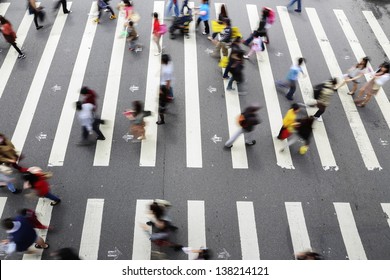 People Walk Through The Road