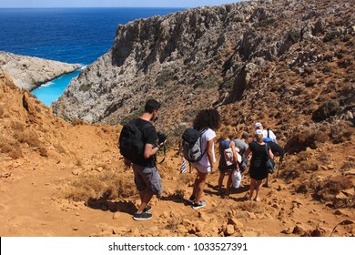 People Walking Down The Cliff To Seitan Limania Beach, Crete, Greece