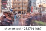 People is walking in Graben St. timelapse, old town main street of Vienna with many shops and restaurants, Austria. Benches with tourists