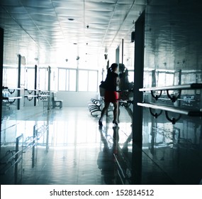 People Walking Through The Hospital Corridor. Blurred Motion