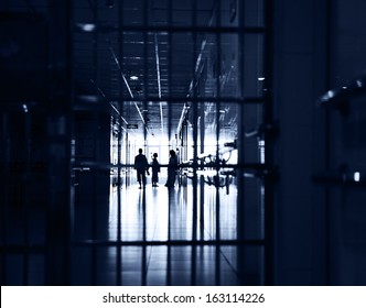 People Walking Through The Hospital Corridor. 