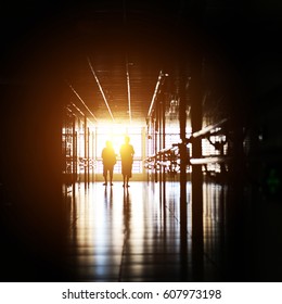 People Walking Through The Hospital Corridor. 