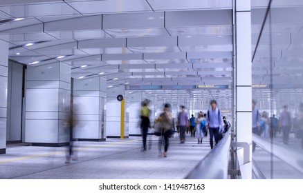 People Walking Through And Underground Passage In Tokyo. Taken With Slow Shutter Speed