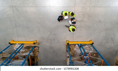 People In Warehouse, Shoot From Above