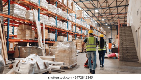 People, warehouse and storage for logistics with boxes, shelf and teamwork at global shipping company. Man, woman and back with trolley for package, distribution or supply chain in industrial factory - Powered by Shutterstock