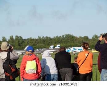 People are watching an airplane show on AirShow. Gdynia, Poland, August 2021