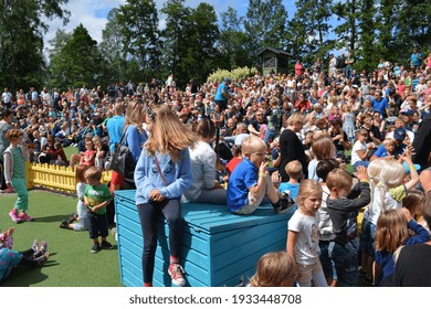 People watching Pippi Longstocking performance at Astrid Lindgren's World theme park, Vimmerby, Sweden. Children's entertainment. Summer holiday. Space for copy. 