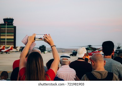 People Watching Take Off A Helicopter At The Airport Of Alguaire (Lleida)