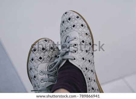 People wear fashion sneakers sitting relax closeup blur background