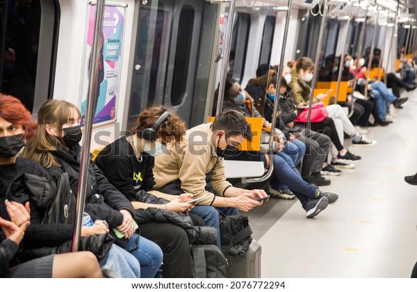 The people wearing disposable medical face mask\
in car of the subway in İstanbul during coronavirus outbreak.\
Safety in a public place while epidemic of covid-19.  12, 11, 2021.\
istanbul, Turkey\
