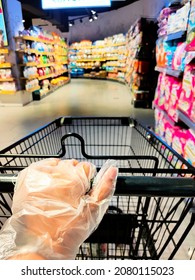 People Wearing Plastic Gloves Shopping In Supermarket, New Normal Because Of Corona-Virus, Covid-19. Business And Healthcare Concept.