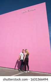 People were taking photos against the pink wall of Paul Smith in LA, USA, in March, 2018.Paul Smith is one of the most popular photo sites for overseas trendsetters.