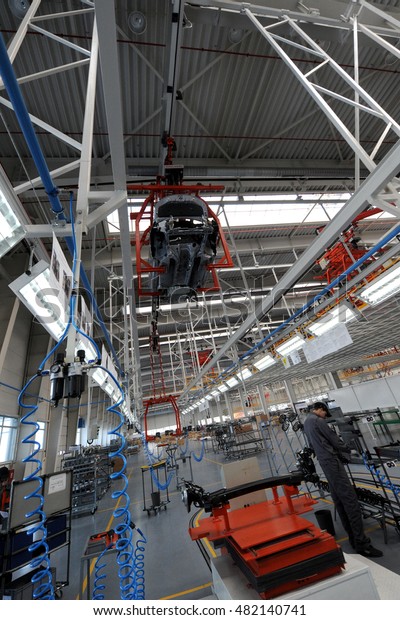 People work in the car factory in Lovech, Bulgaria,\
February 21, 2012