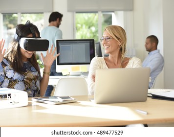 People at work testing VR headset equipment