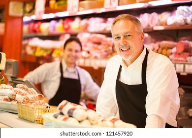 People working in a grocery store - Powered by Shutterstock