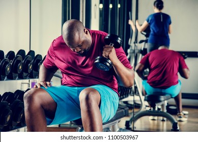 People Working Out At A Gym