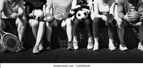 People working out at an outdoor gym - Powered by Shutterstock