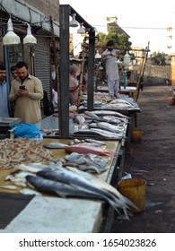 People Working In  A Seafood Market And Food Street Near Kemari Harbour - Karachi Pakistan - 2018