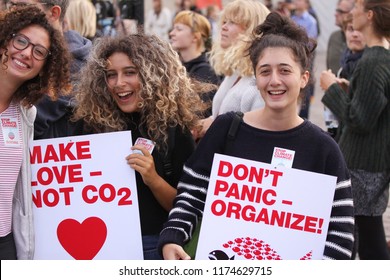 The Peoples Climate March For Global Climate Movement.Protesters  Three Young Girls With Sign Saying Make Love - Not CO2. Copenhagen, Denmark - September 8, 2018.