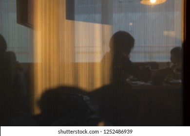 people's shadow in restaurant