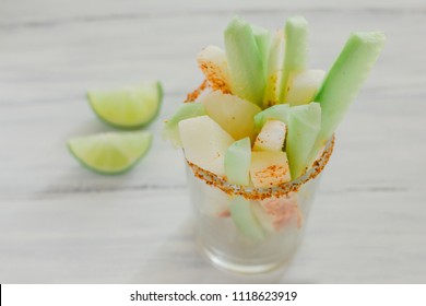 pepinos and jicama con chile, cucumber and jicamas with chili mexican snack spicy food in mexico