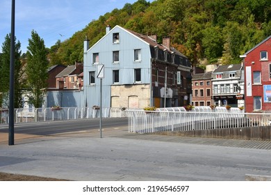 Pepinster, Province Of Liège, Belgium - August, 30, 2022: Aftermaths Flooding Mid-July 2021. Follow Up End August 2022 Rue De La Régence Renovated Street One Year Later Flowers On Bridge Railing