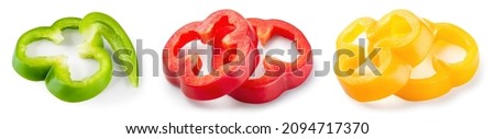 Pepper slice isolated. Paprika on white background. Cut red, green, yellow bell pepper. With clipping path.