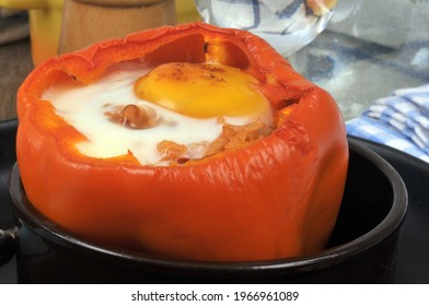 Pepper Stuffed With A Fried Egg Served In A Ramekin Close-up 