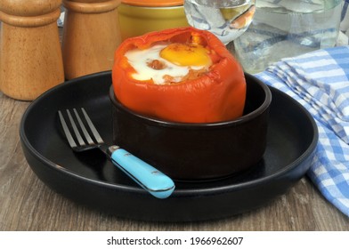 Pepper Stuffed With A Fried Egg Served In A Ramekin Close-up