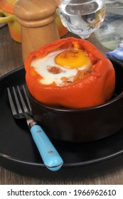 Pepper Stuffed With A Fried Egg Served In A Ramekin Close-up