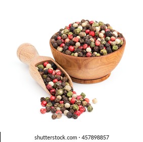 peppercorn mix in a wooden bowl isolated on white - Powered by Shutterstock