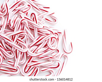 Peppermint Candy Canes On White Background.